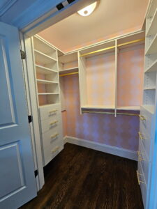 White Melamine Closet with Gold Accents