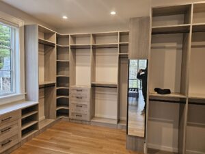 Dreamy Custom Primary Bedroom Closet in River Rock