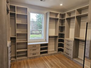 Dreamy Custom Primary Bedroom Closet in River Rock