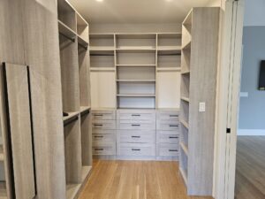 Dreamy Custom Primary Bedroom Closet in River Rock