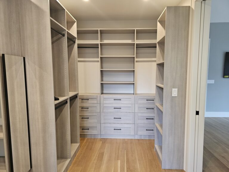 Dreamy Custom Primary Bedroom Closet in River Rock