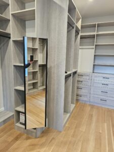 Dreamy Custom Primary Bedroom Closet in River Rock